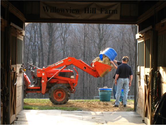 Loading A Tractor with Manure